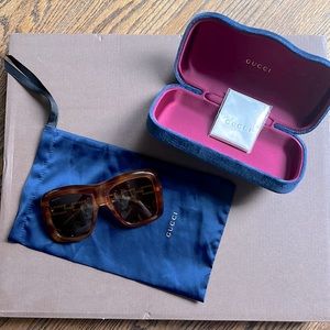 Gorgeous original GUCCI sunglasses. Brown with gold metal sides and blue case!